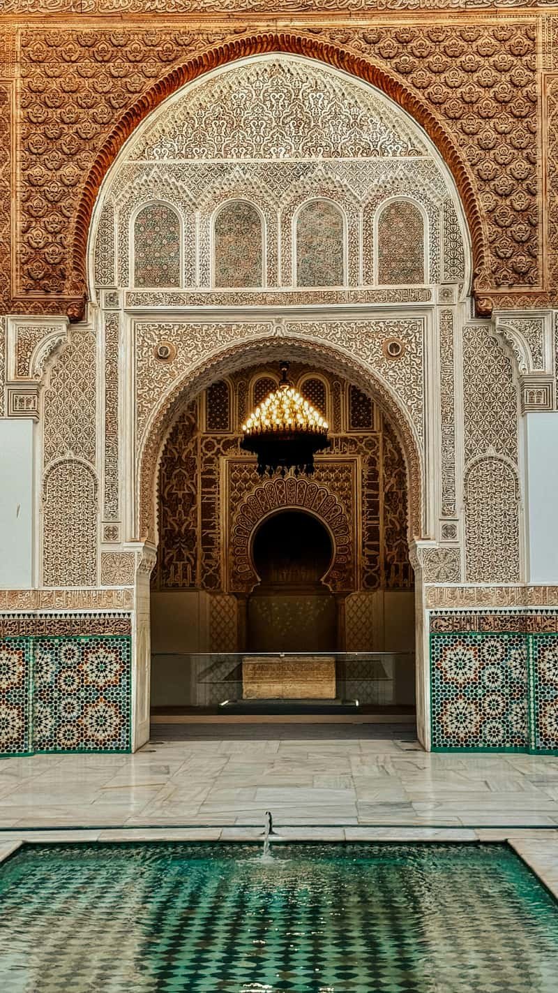 Intricate zellige tilework and carved stucco in Bahia Palace Marrakech